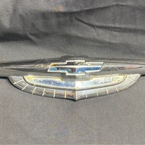 Vintage 1950s Chevrolet Black and Silver Car Emblem from the hood of trucks